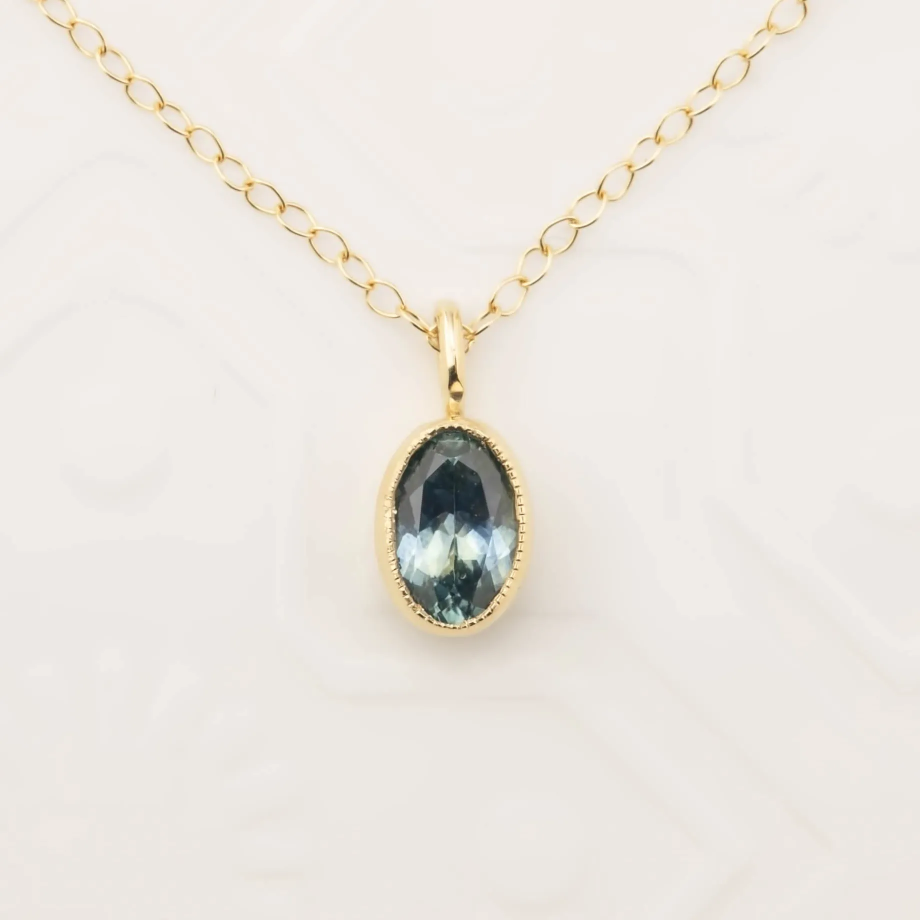 Ocean Blue Montana Sapphire Bezel Set Charm Necklace (One of a kind)