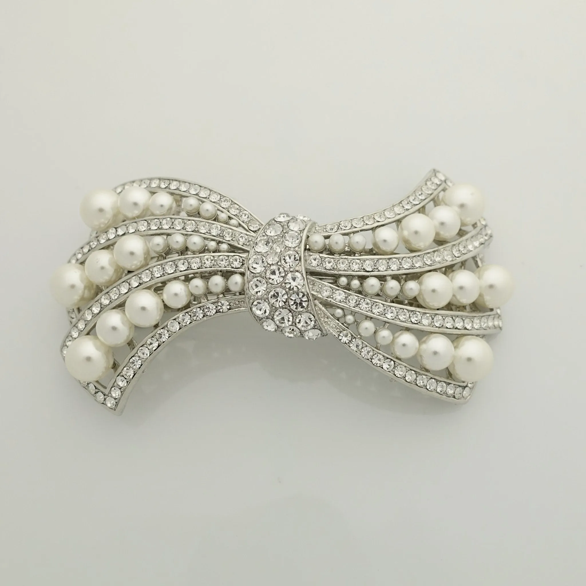 pearl rhinestone decorated leaf wave bow french barrette