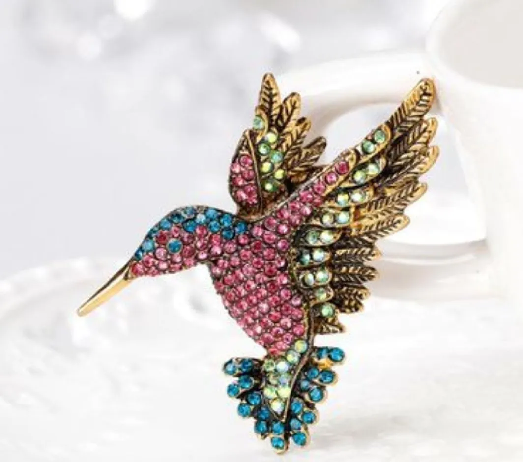 Studded bird brooch