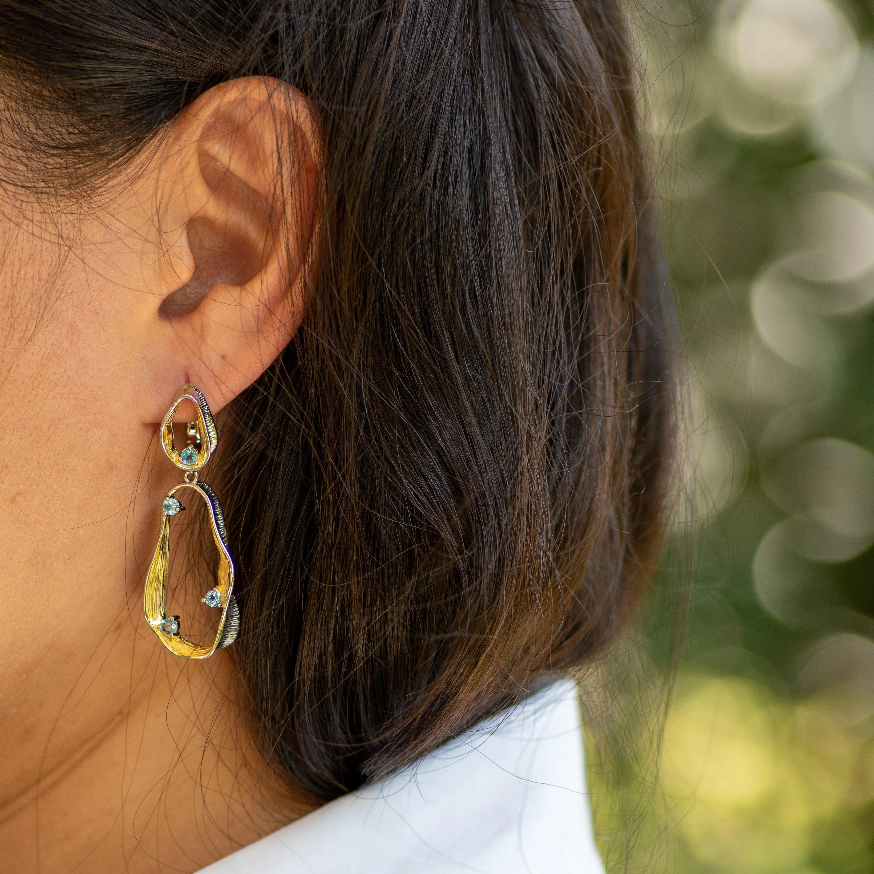 Swirl Blue Topaz Earrings in Sterling Silver