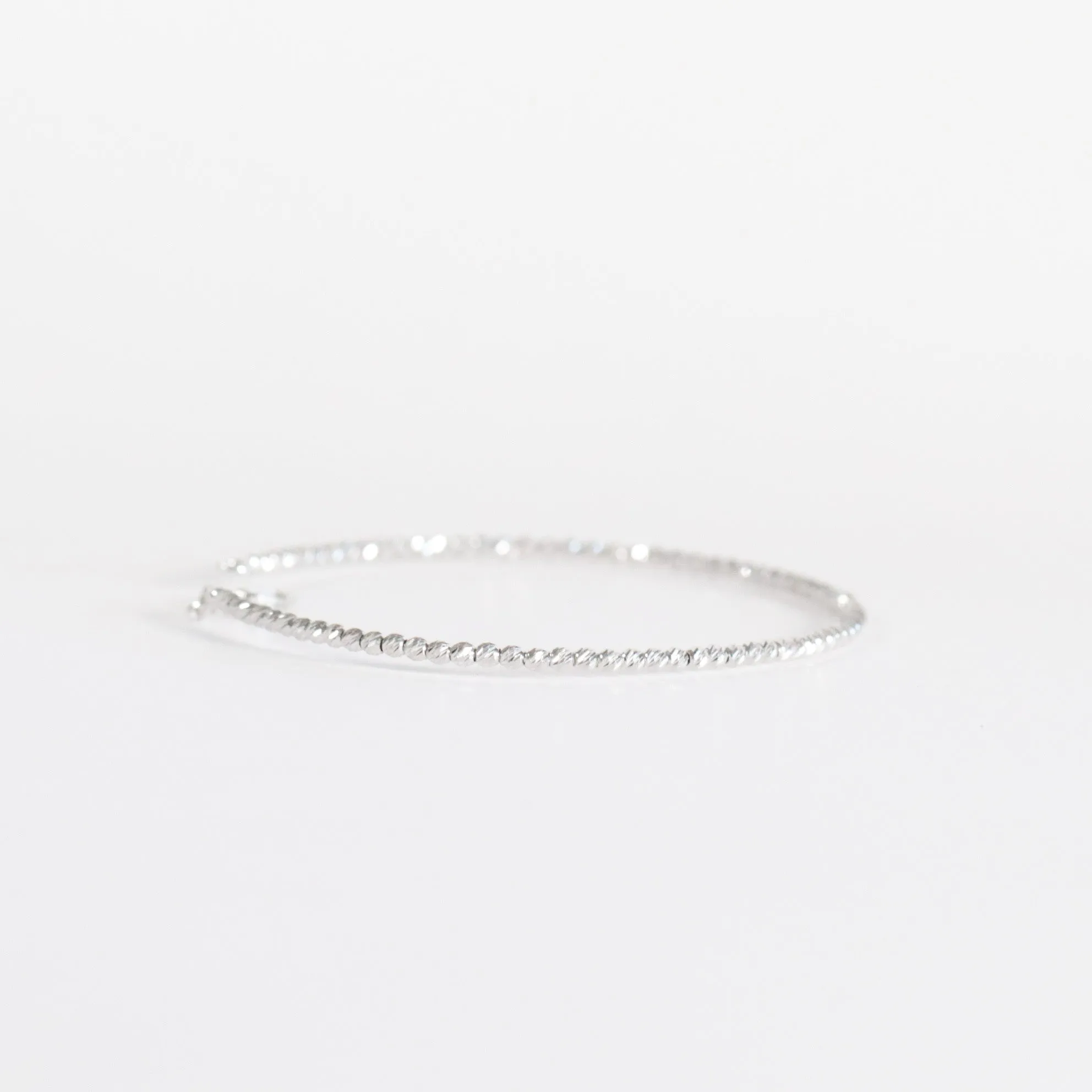 White Gold Diamond-Cut Bead Bangle