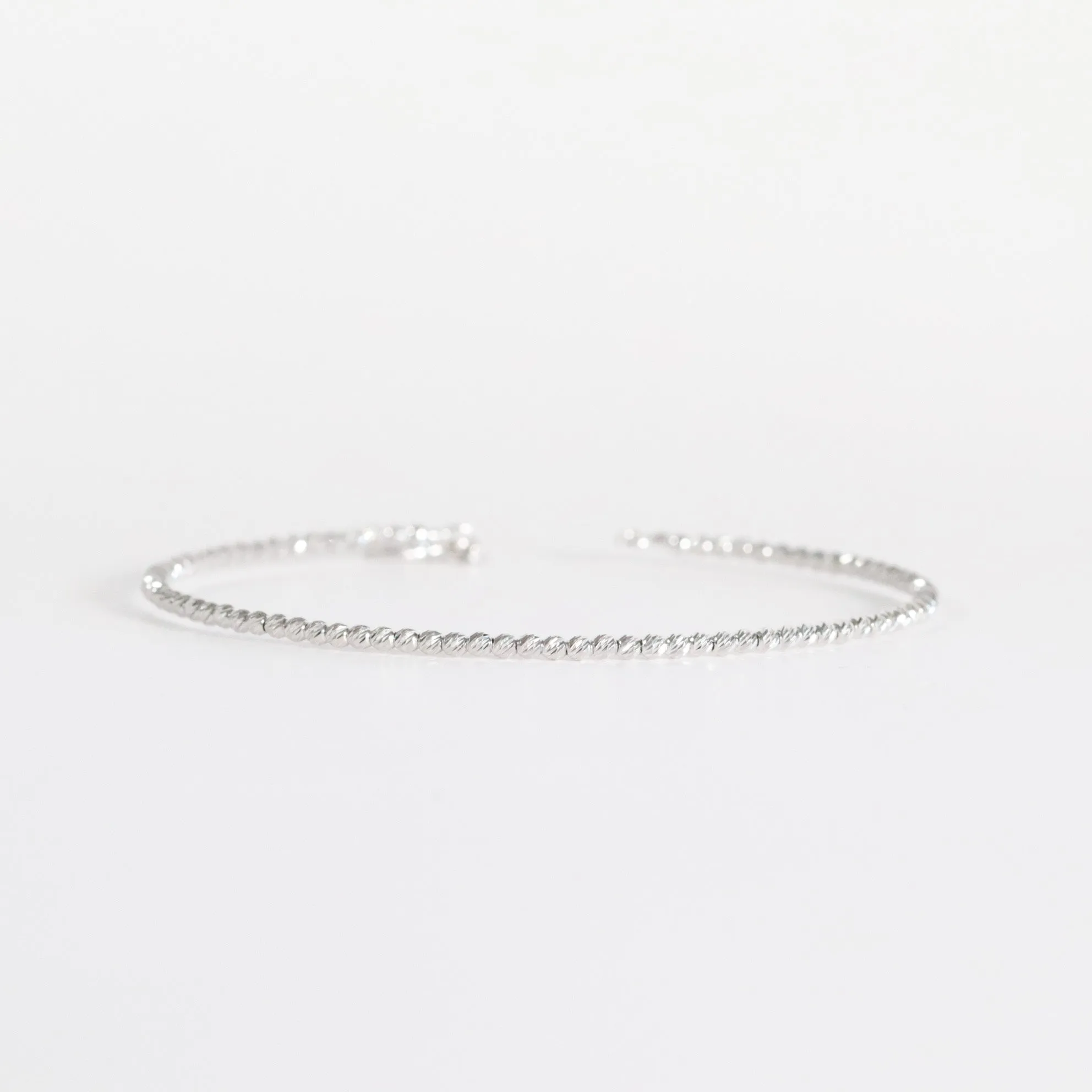 White Gold Diamond-Cut Bead Bangle