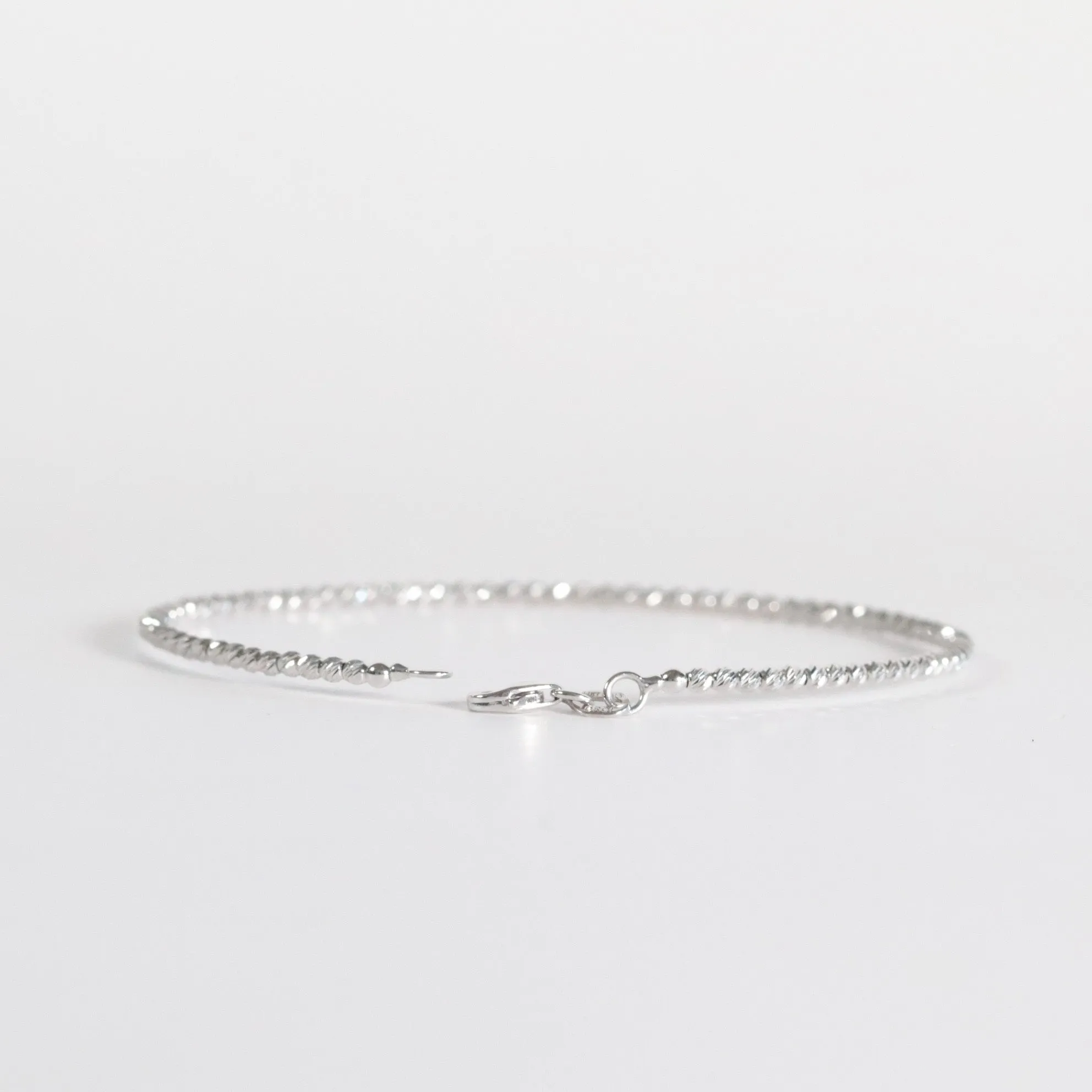 White Gold Diamond-Cut Bead Bangle